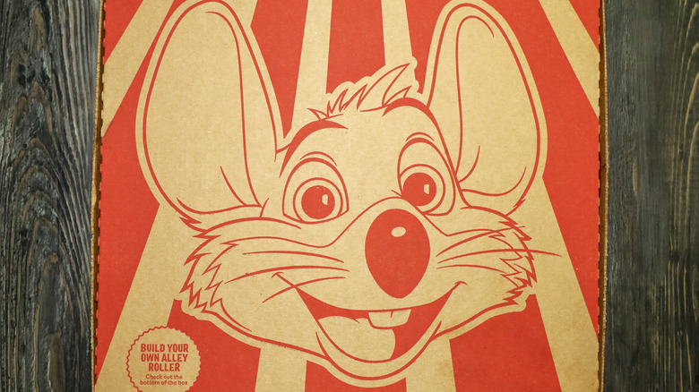 Chuck E. Cheese box on display