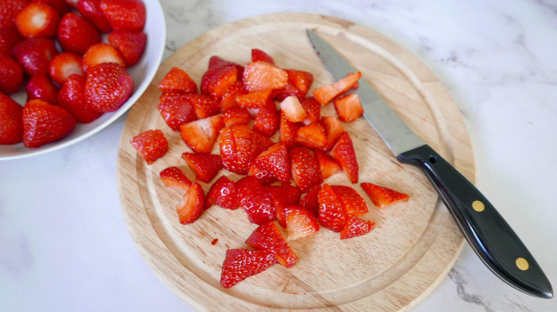 strawberries on cutting board 