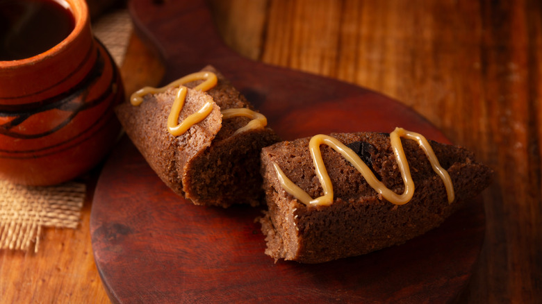 Chocolate tamale on wooden plate