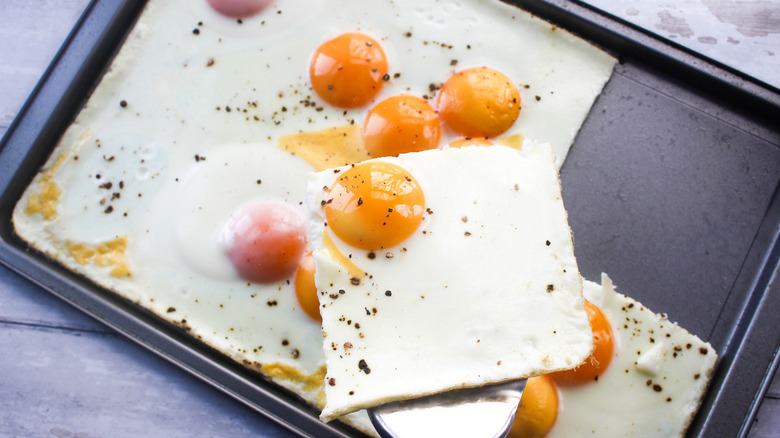 fried eggs on sheet pan