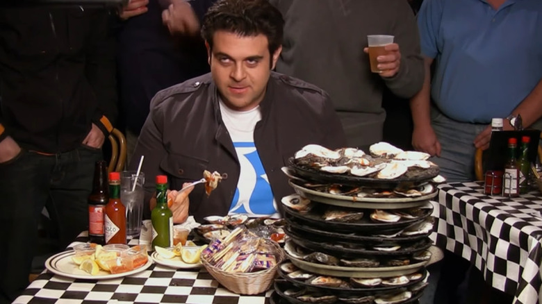 Adam Richman downing oysters