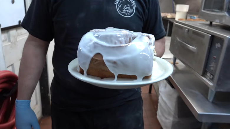 man with huge cinnamon roll