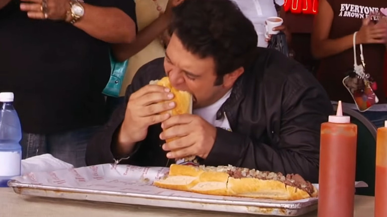 Adam eating huge cheesesteak