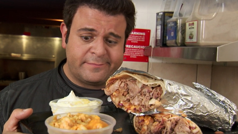 Richman holding massive burrito