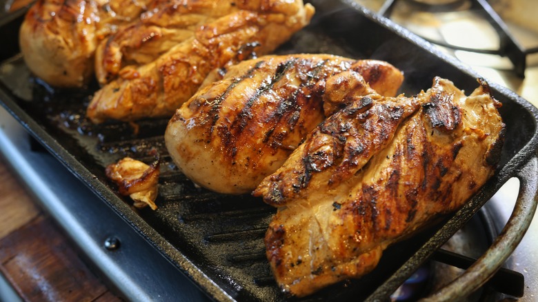 pan of grilling chicken