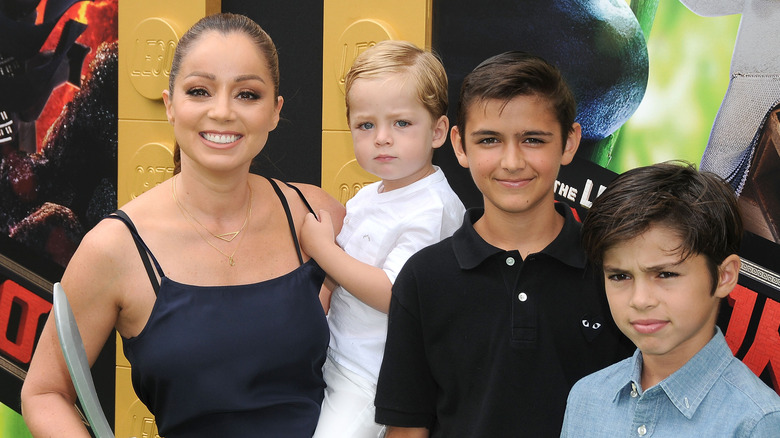 Marcela Valladolid with her children at a movie premiere