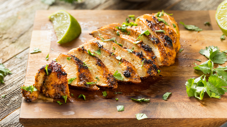 Chili lime chicken with cilantro on a cutting board