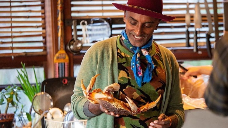 Marcus Samuelsson with crab