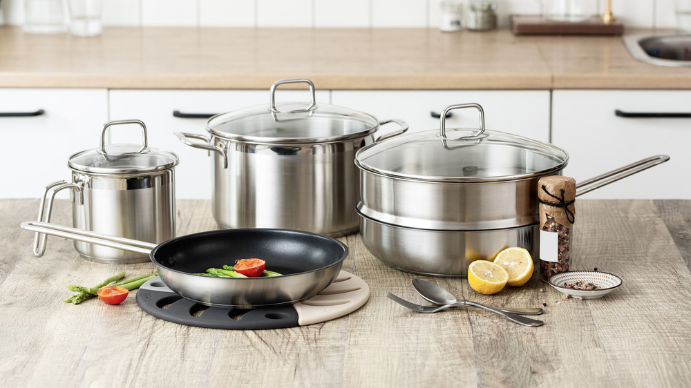 Pots and pans sitting on kitchen counter