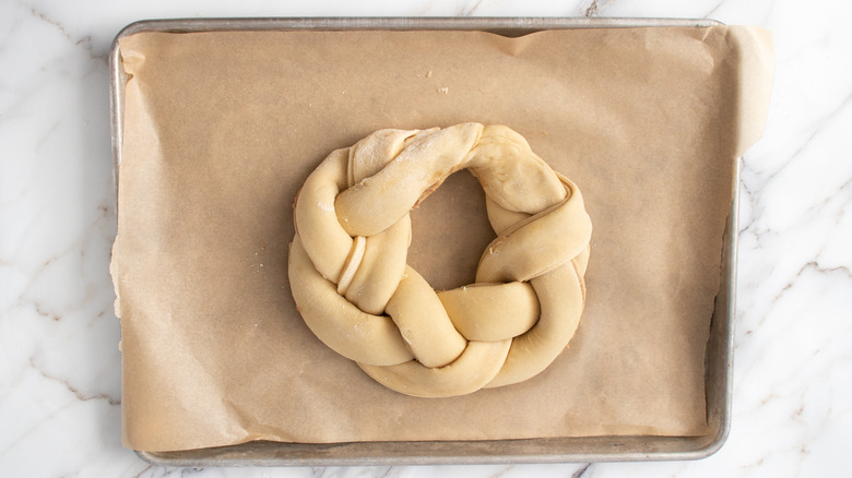 braided dough ring on sheet