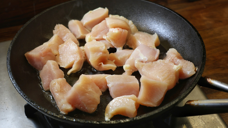 skillet full of cubed chicken breast