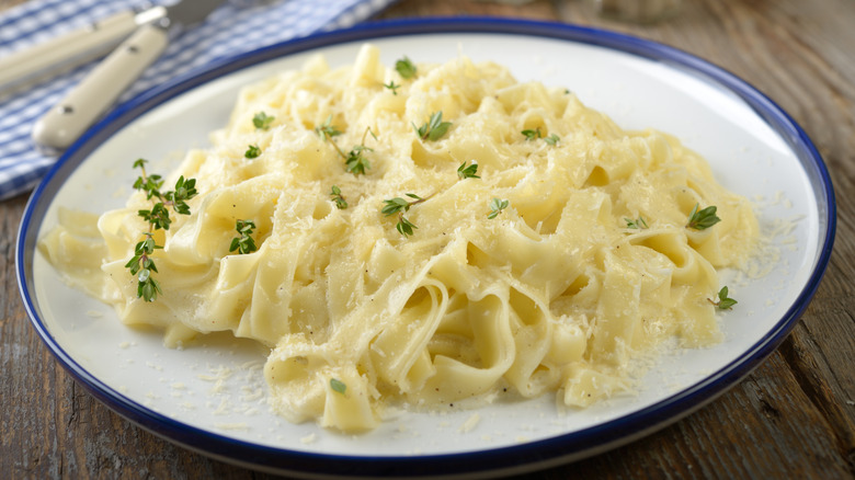 pasta and Alfredo on a plate