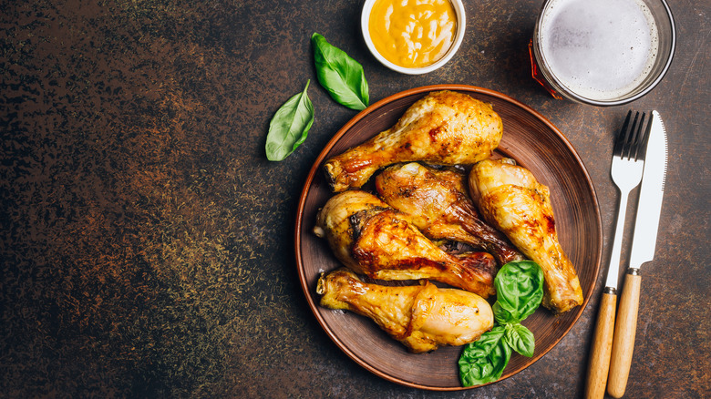 a plate of mustard-baked chicken