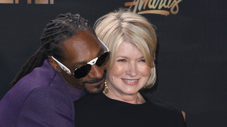 Martha Stewart and Snoop Dogg cheek to cheek 