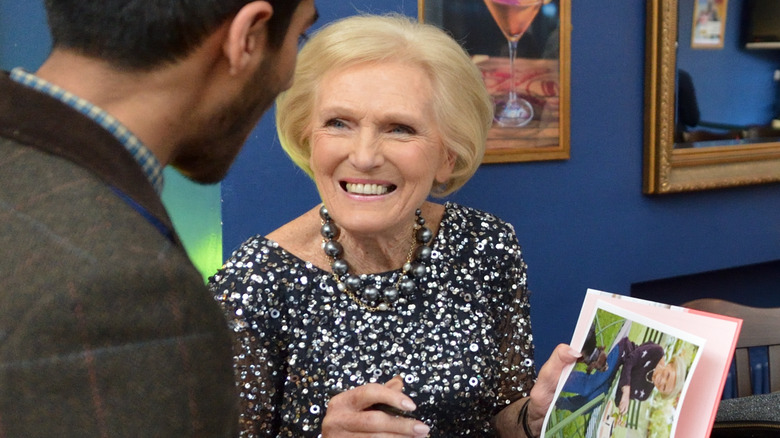 Mary Berry smiles at a book signing