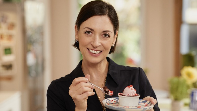 Mary McCartney holding a dessert