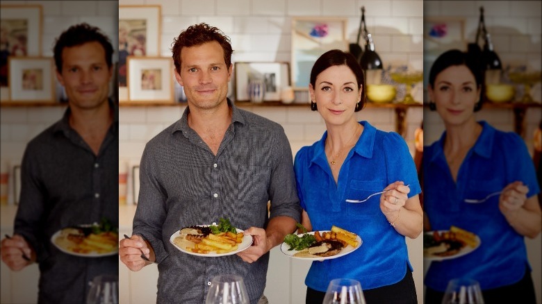 Jamie Dornan and Mary McCartney holding steak frites