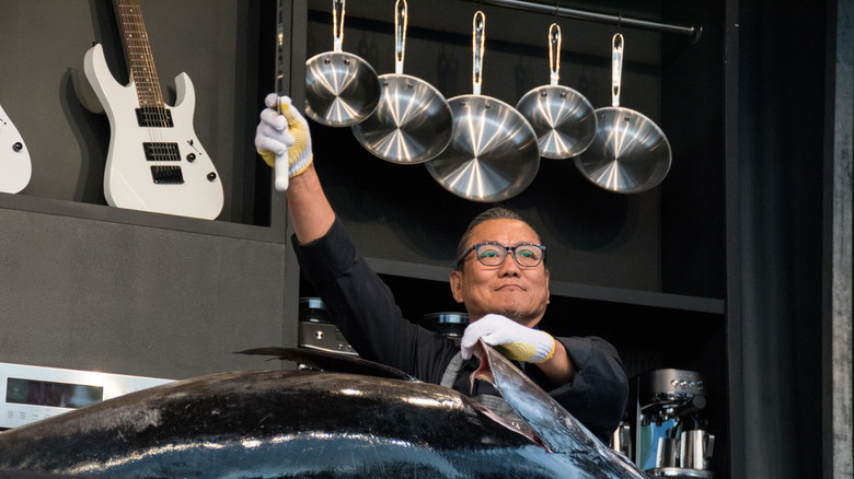 Iron Cheg Morimoto carves a tuna