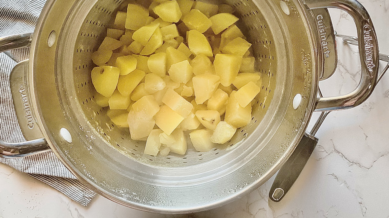 chopped potatoes in water