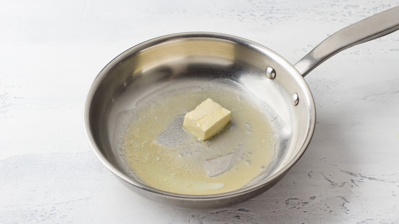 Butter melting in skillet