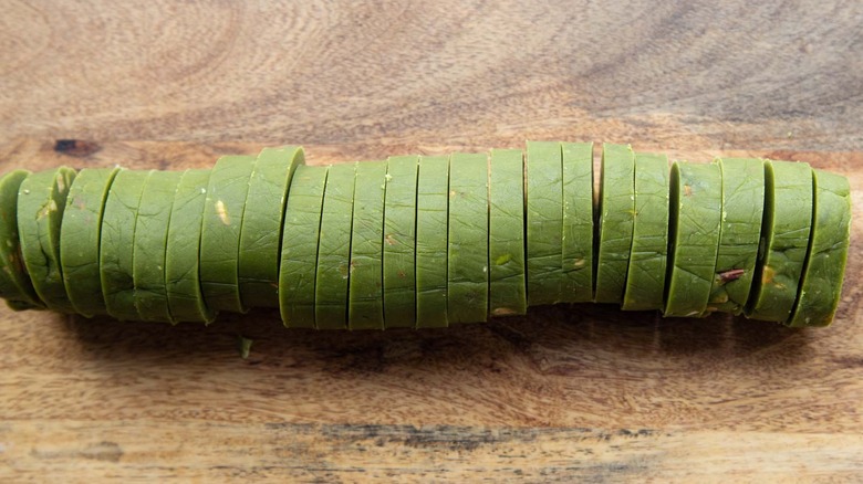 sliced green cookie dough log