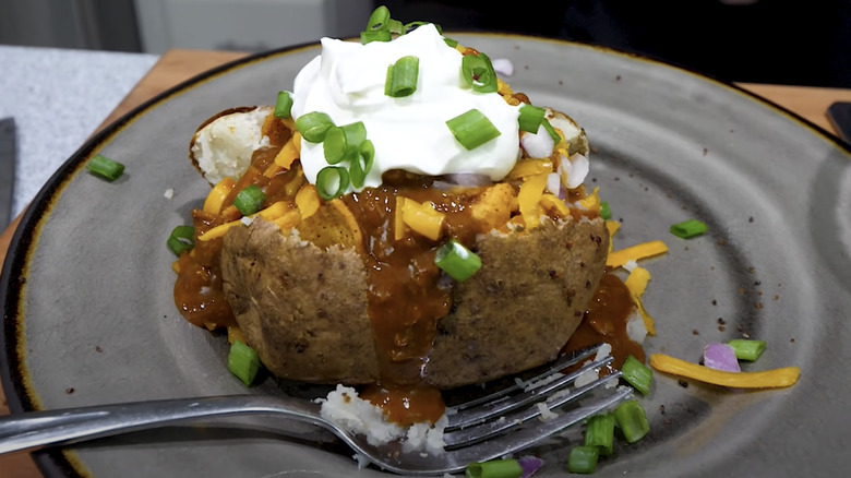 Baked potato with chili and cheese