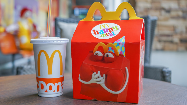 A McDonald's Happy Meal next to drink