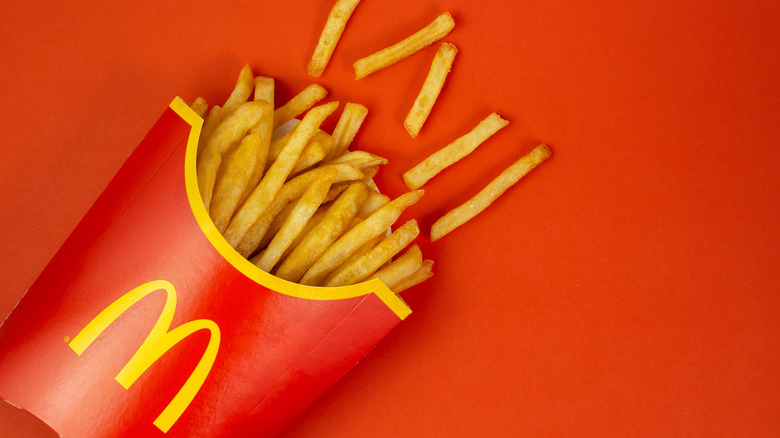 McDonald's fries over a red background