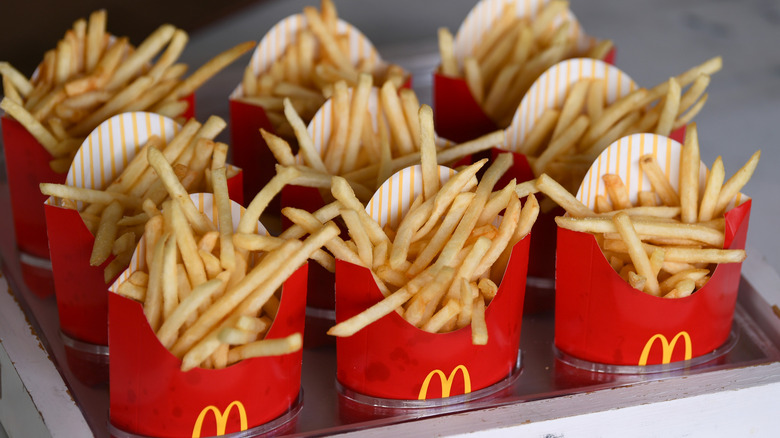 Several containers of McDonald's french fries