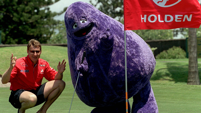 Grimace golfing