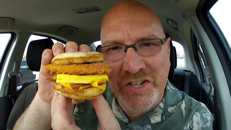 Man holding Chicken McGriddle