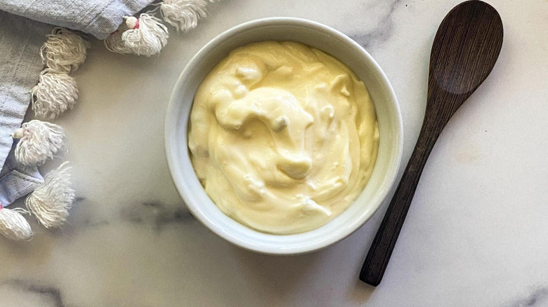 Bowl of tartar sauce with spoon