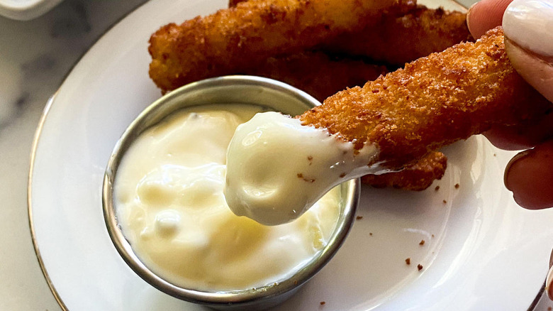 Tartar sauce in bowl with spoon