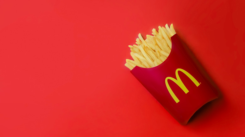 mcdonald's french fries on red background