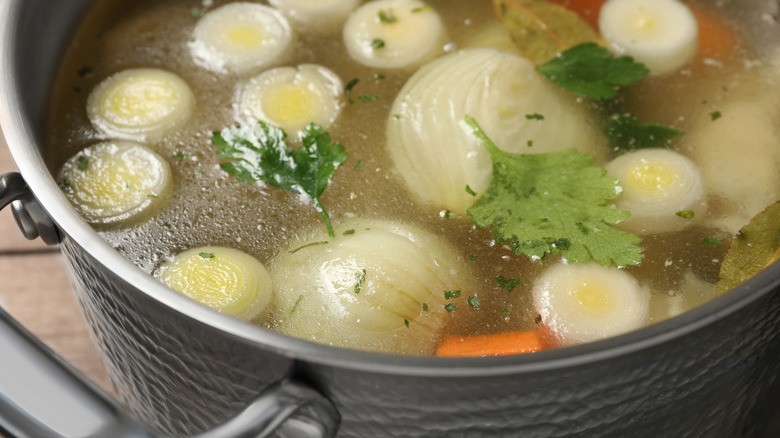 vegetables cooking in broth