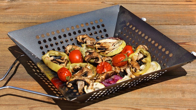 grill basket with vegetables