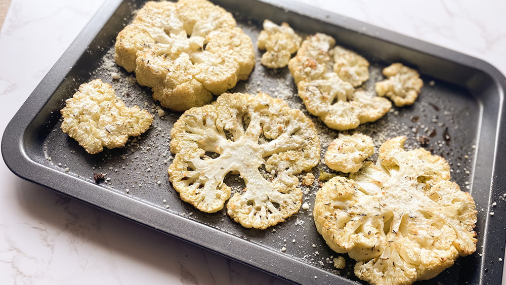 Cauliflower steaks on baking tray