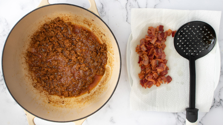 crumbled sausage cooking in pot