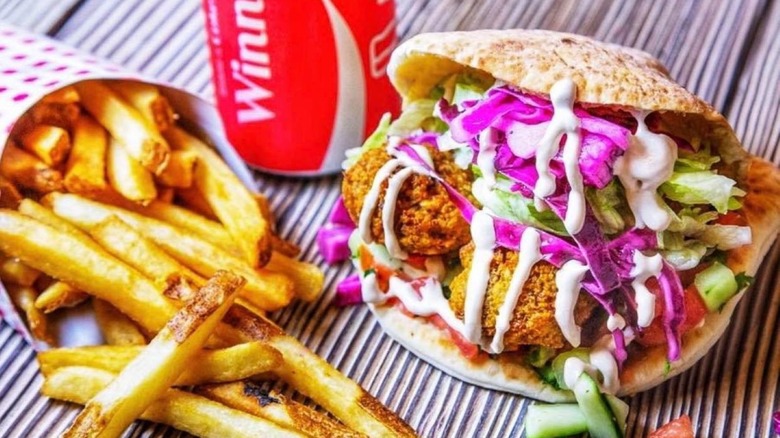 Falafel pita, French fries, and Coke