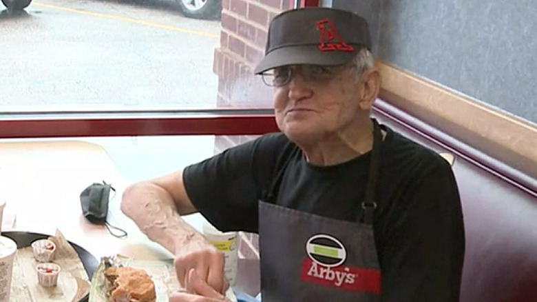 Jack Burkett working at Arby's with mask and visor