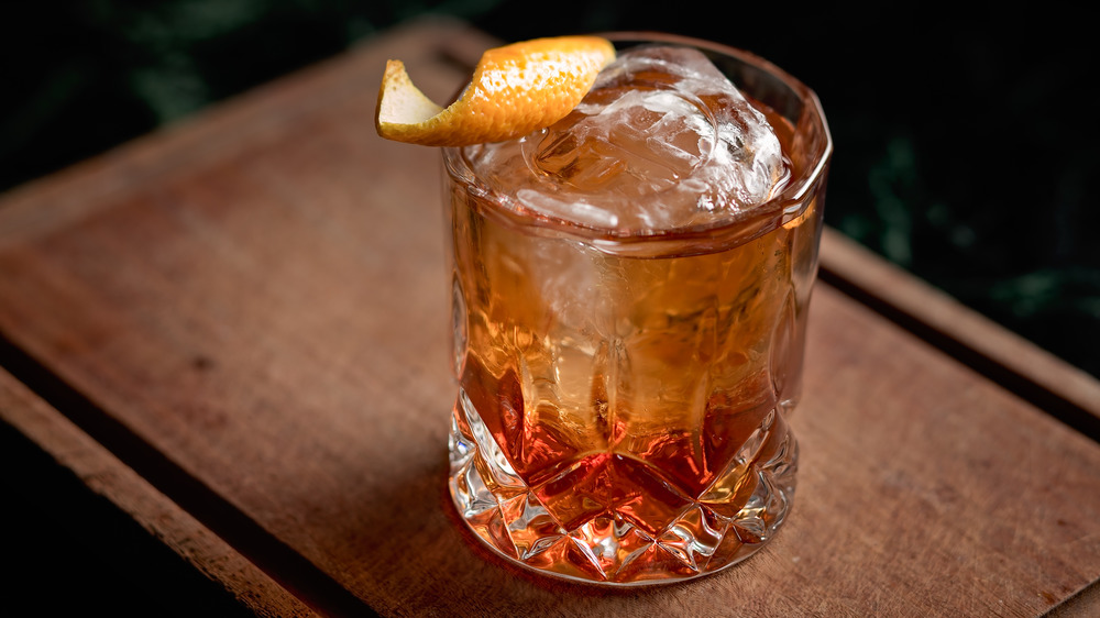 Old fashioned in a nice glass on wood