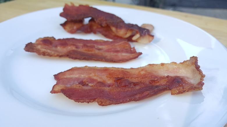 crispy edges of baked bacon