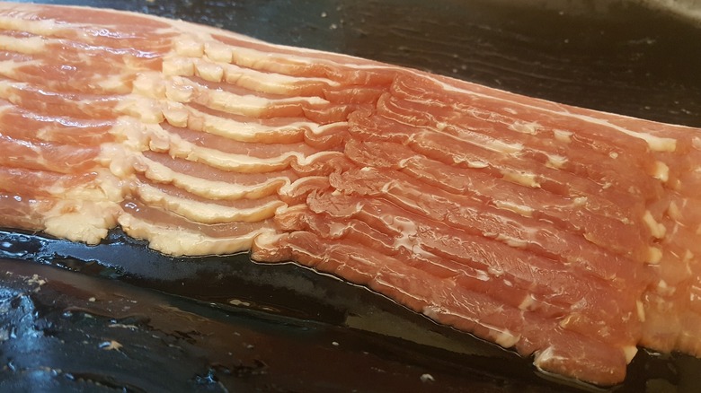 raw bacon in open package