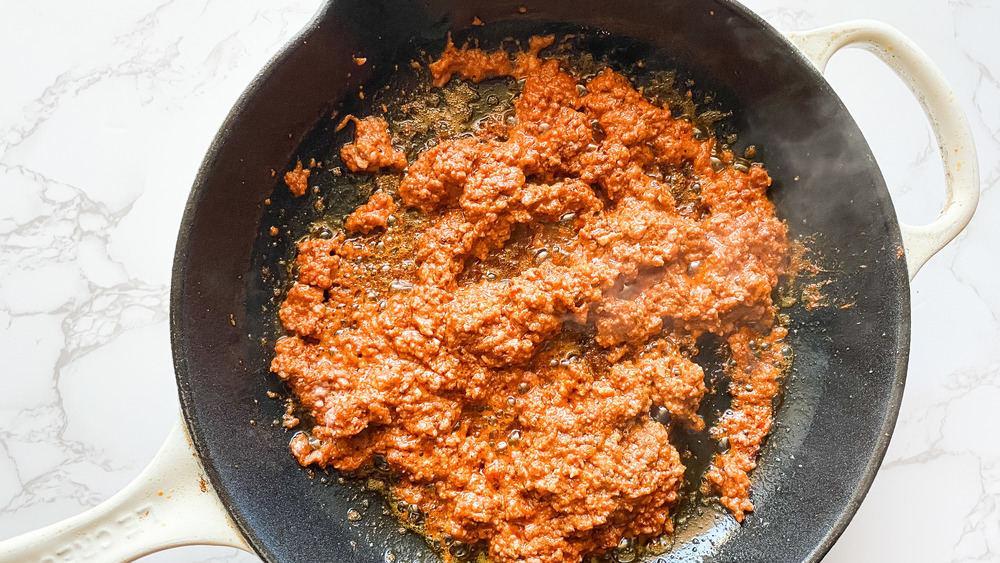 chorizo cooking in a pan