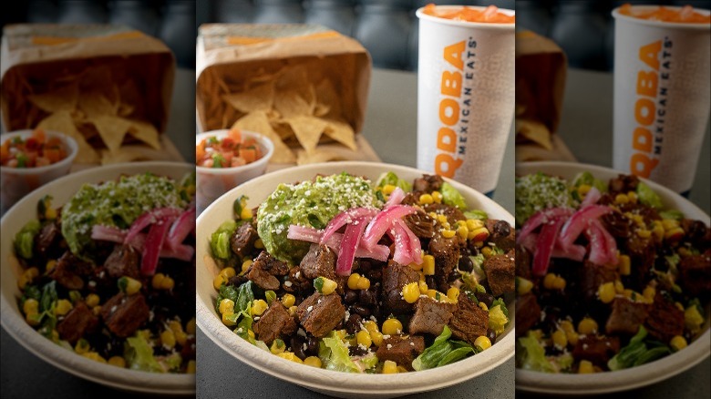 steak burrito bowl, chips, and drink