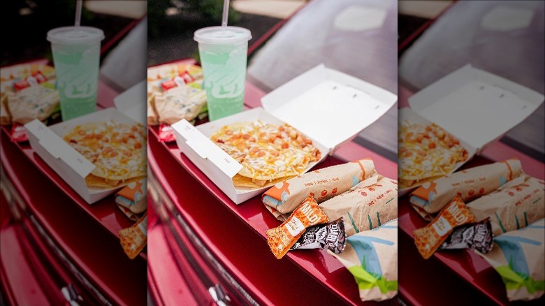 Taco Bell takeout on a car