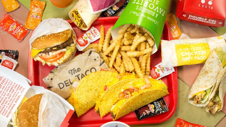 Del Taco taco, fries, and burger on tray