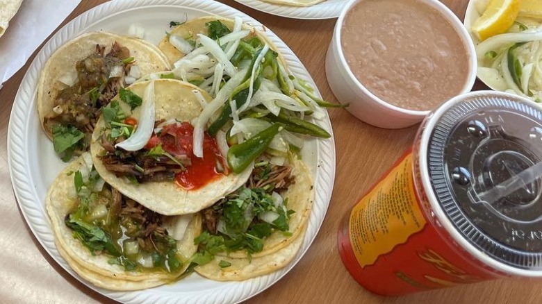 tacos beans and drink from Filiberto's