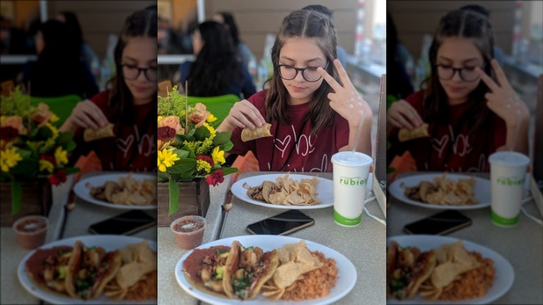 Girl eating at Rubio's Coastal Grill