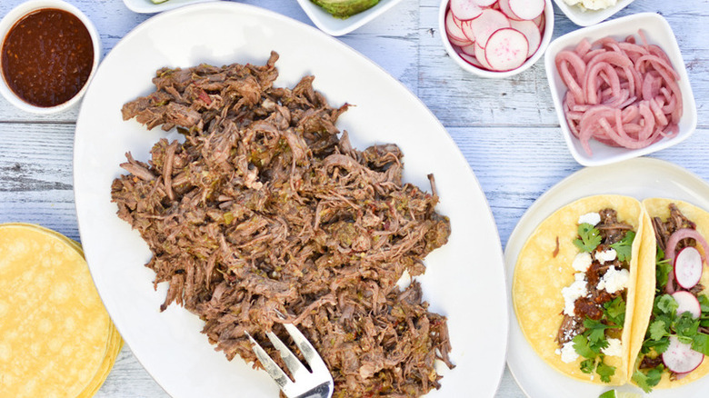 Platter of shredded beef and tortillas